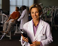 Picture of a physical therapist in an exercise room